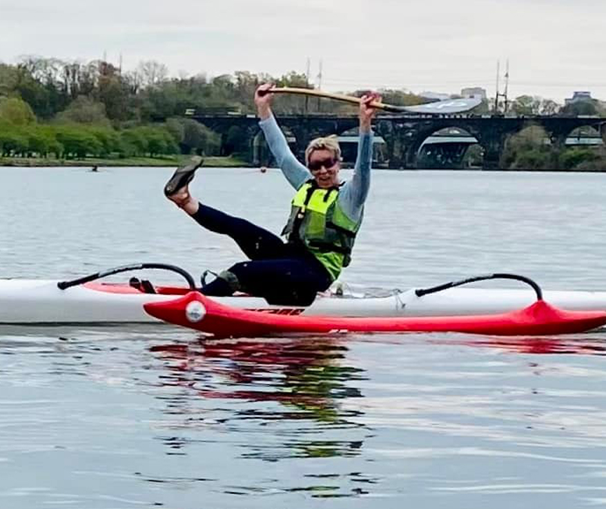 Photo of a woman on a canoe